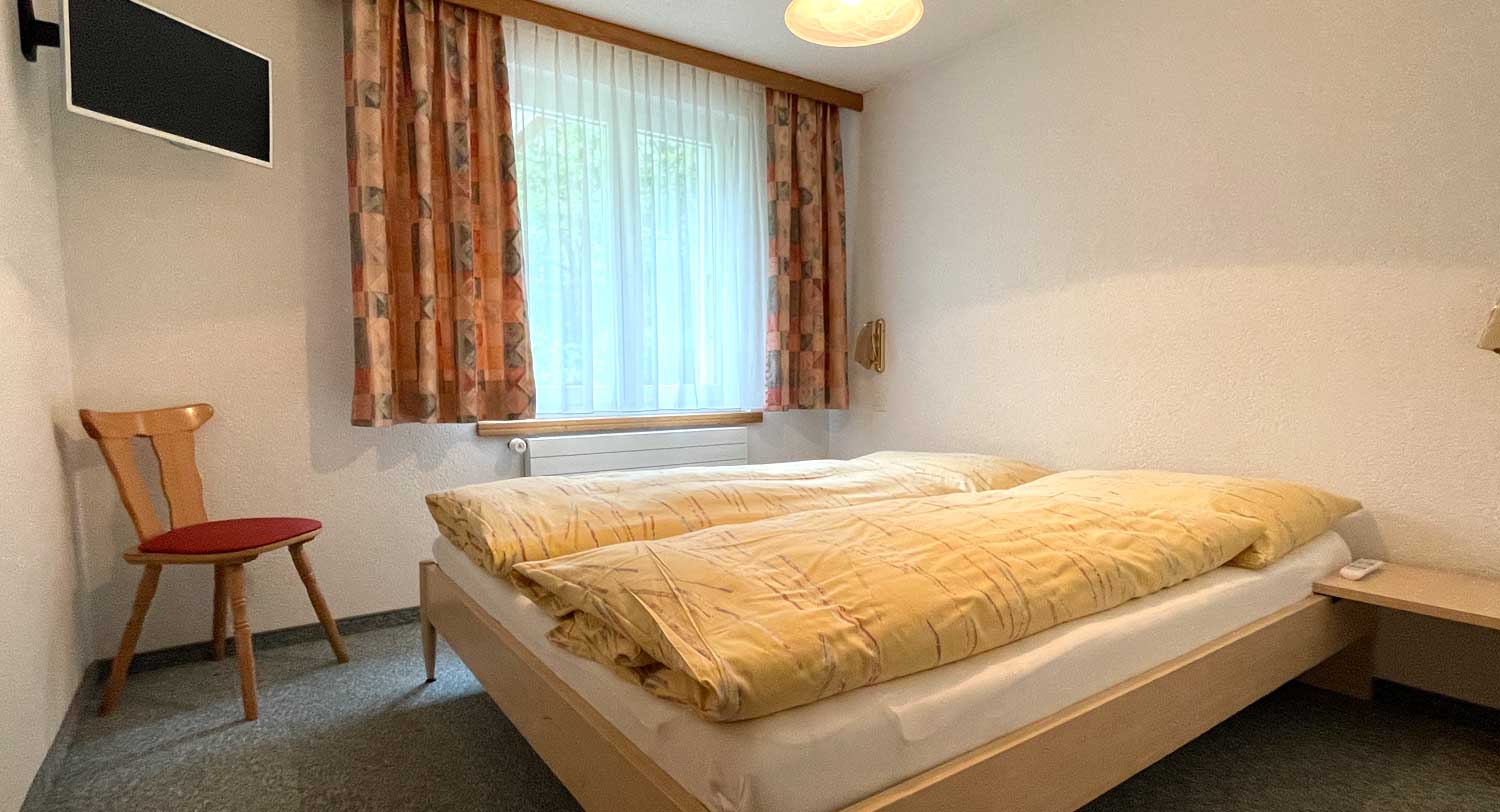 ABA Gentinetta 2: Schlafzimmer mit Doppelbett.
